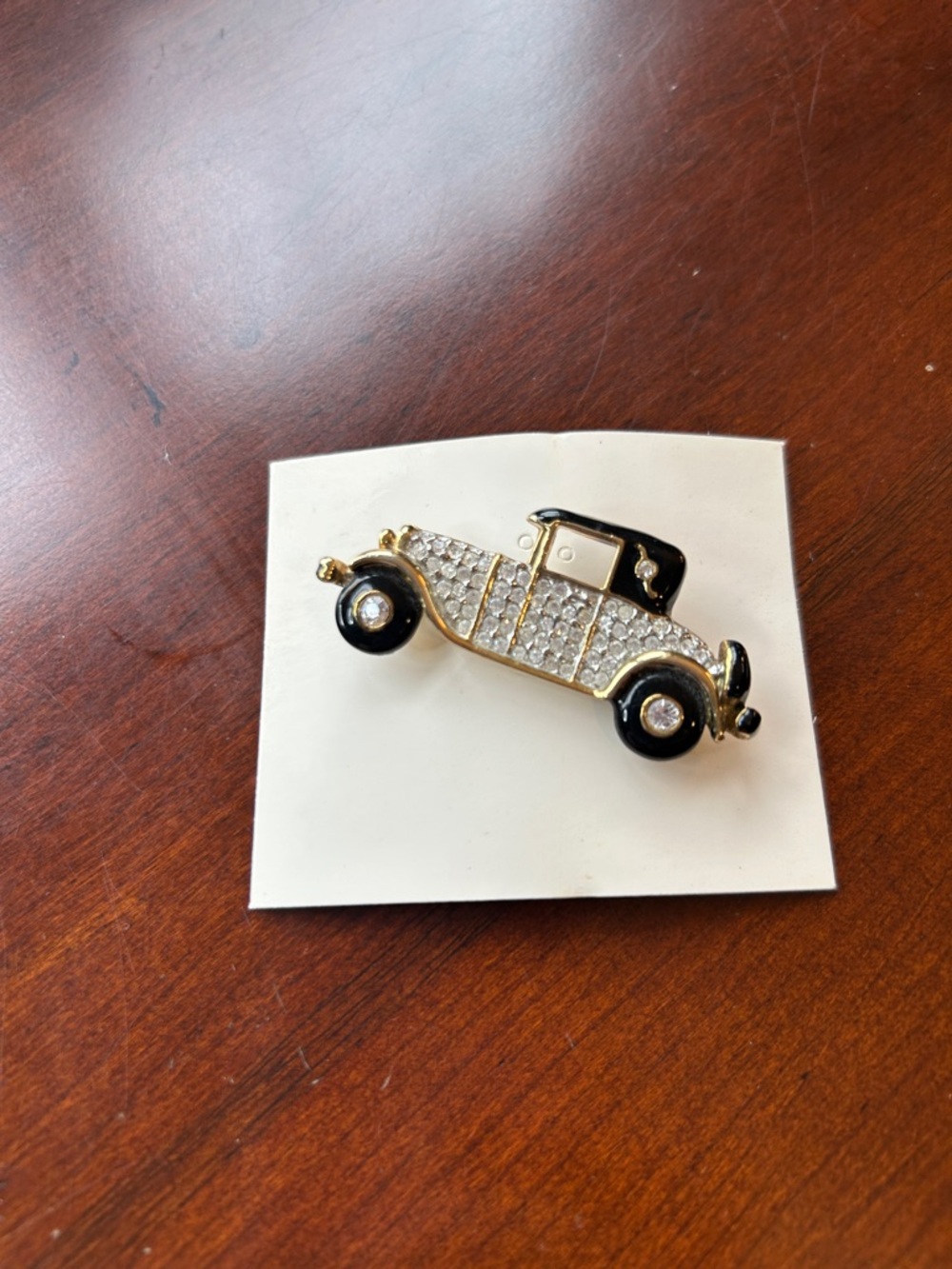 Vintage RS motor car brooch gold tone Swarovski signed black enamel roll over